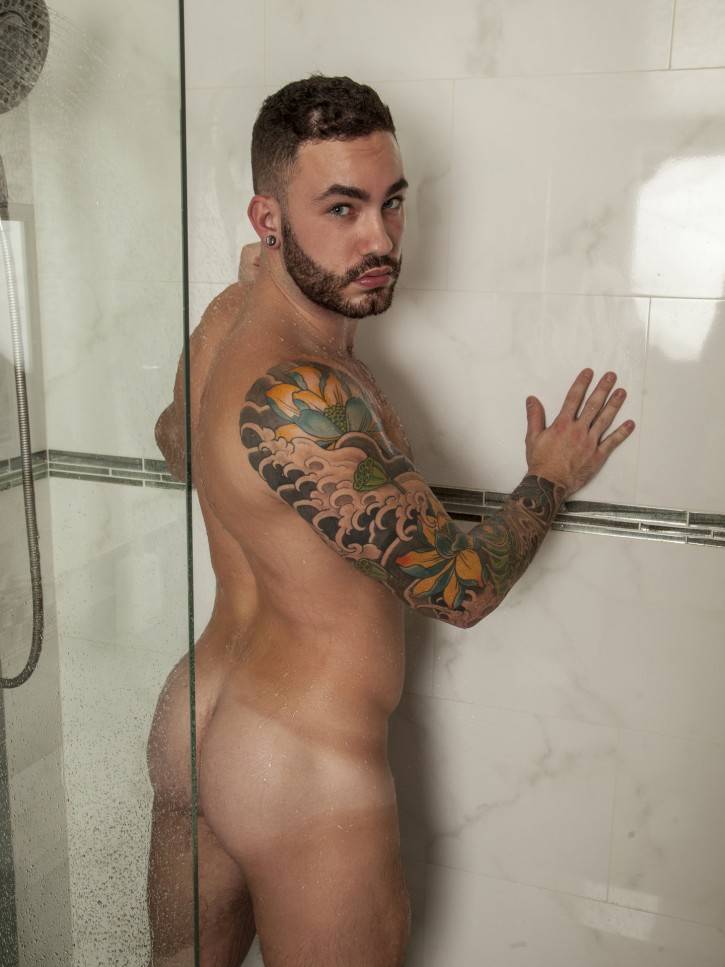 Judas Cole is sweaty from his work out so he decides to shower off. Adrian is patiently waiting hard as a rock for him to finish. When Judas exits the shower, his fat shaft is at full attention. His hairy chest hovers over Adrian and they begin to kiss. They make out and then finally start to suck each other off. But Adrian needs his hole played with. Judas pulls out a toy and fucks him with it until they both cum buckets all over Adrian’s chest. Be sure to check out the free gay porn pics of the hot action here at Randy Blue.