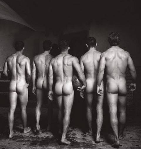 Line up of Guys With Their Butts to The Camera