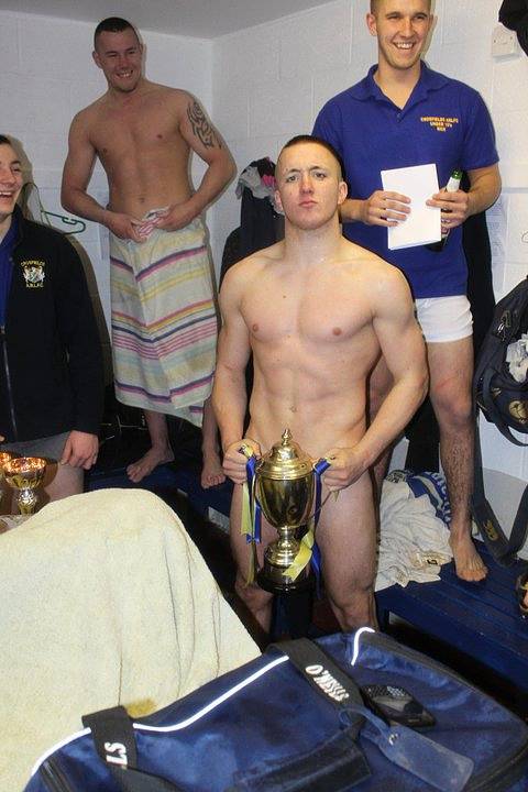 Hot Rugby Player Covering his Cock with a Trophy