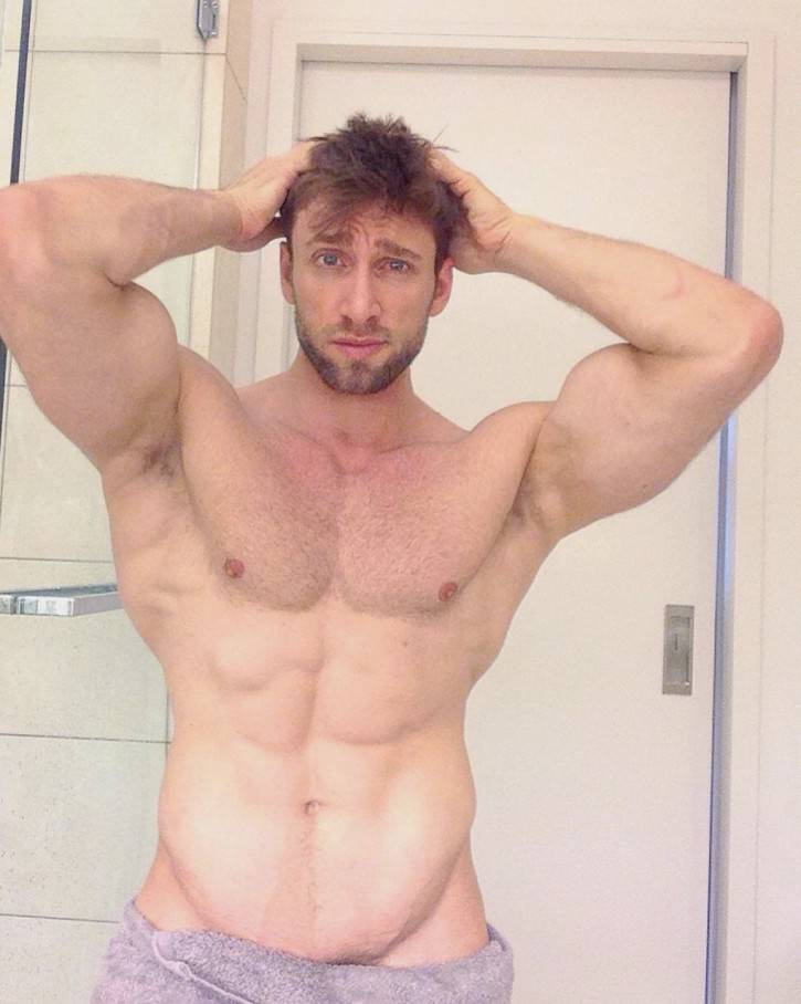 Muscular Player Showing off His Arms in a Towel