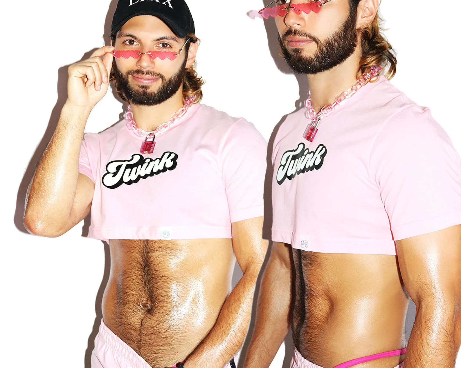 gay oiled up hairy twink wearing lolita sunglasses and a gay crop top with the words twink on the front from Marek Richard