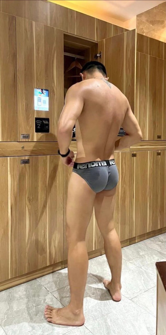 hot muscle athlete posing in wet undies in gay locker room