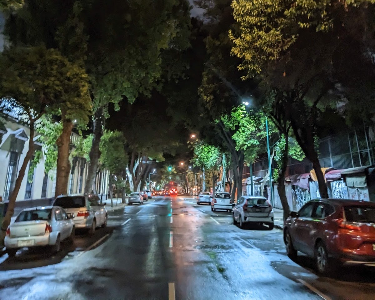 the night streets near La Ciudadela with parked cars and a dark night sky where many gay bisexual and curious males go for gay cruising and anonymous gay hookups