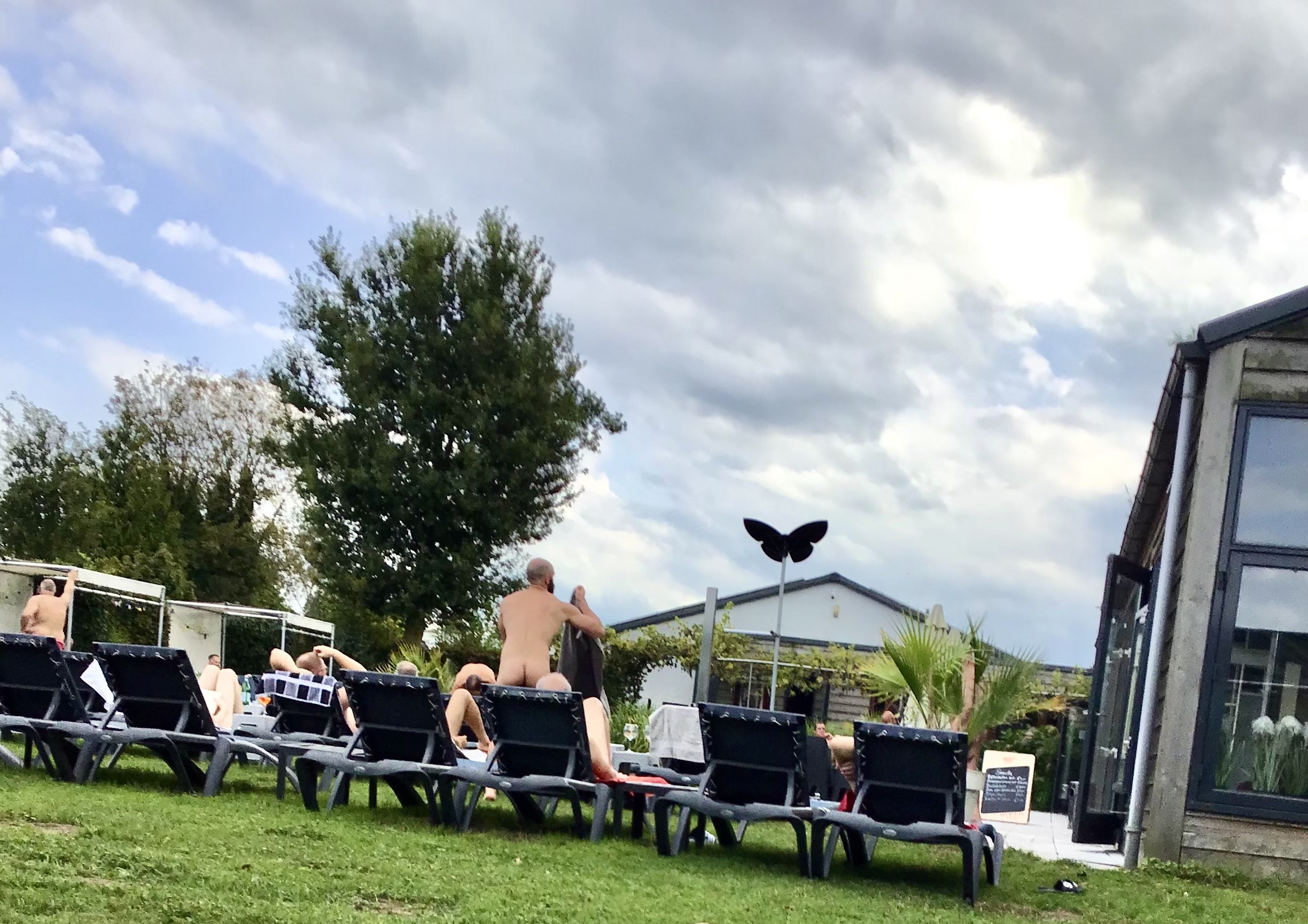 poolside photo of gay naked males gay cruising outdoors at gay male resort in drunen netherlands the dunez gay male spa and bathhouse