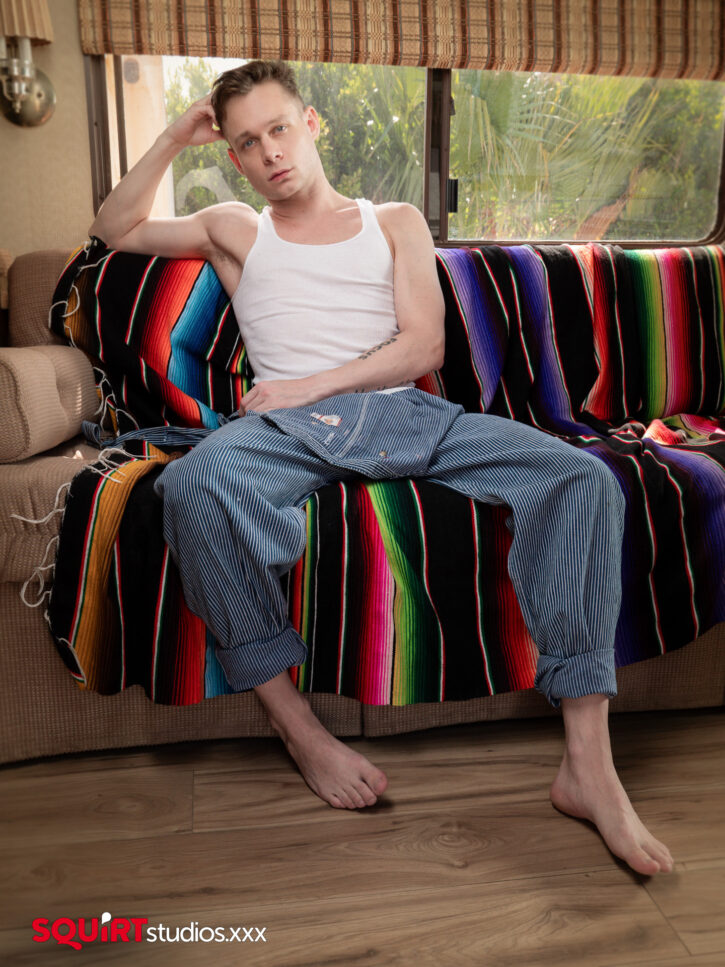 Andrew Connor gay xxx porn creator and porn actor looking at the camera ready to get fucked in gay porn studio promo scene for Squirt Studios