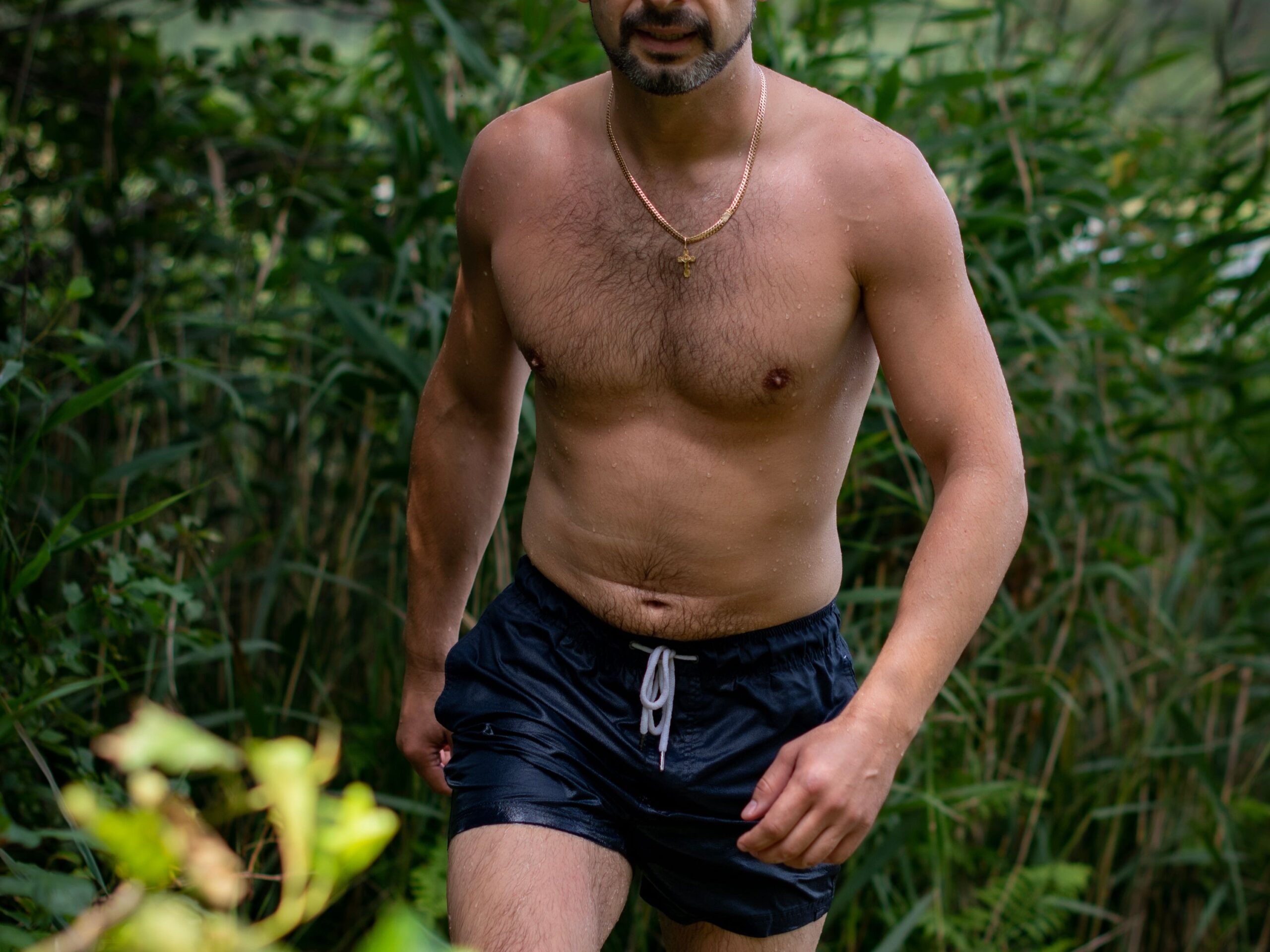 gay male walking through gay male cruising park in berlin germany looking for hot and horny gay hookups and cruising for sex via mr alex photography via pexels