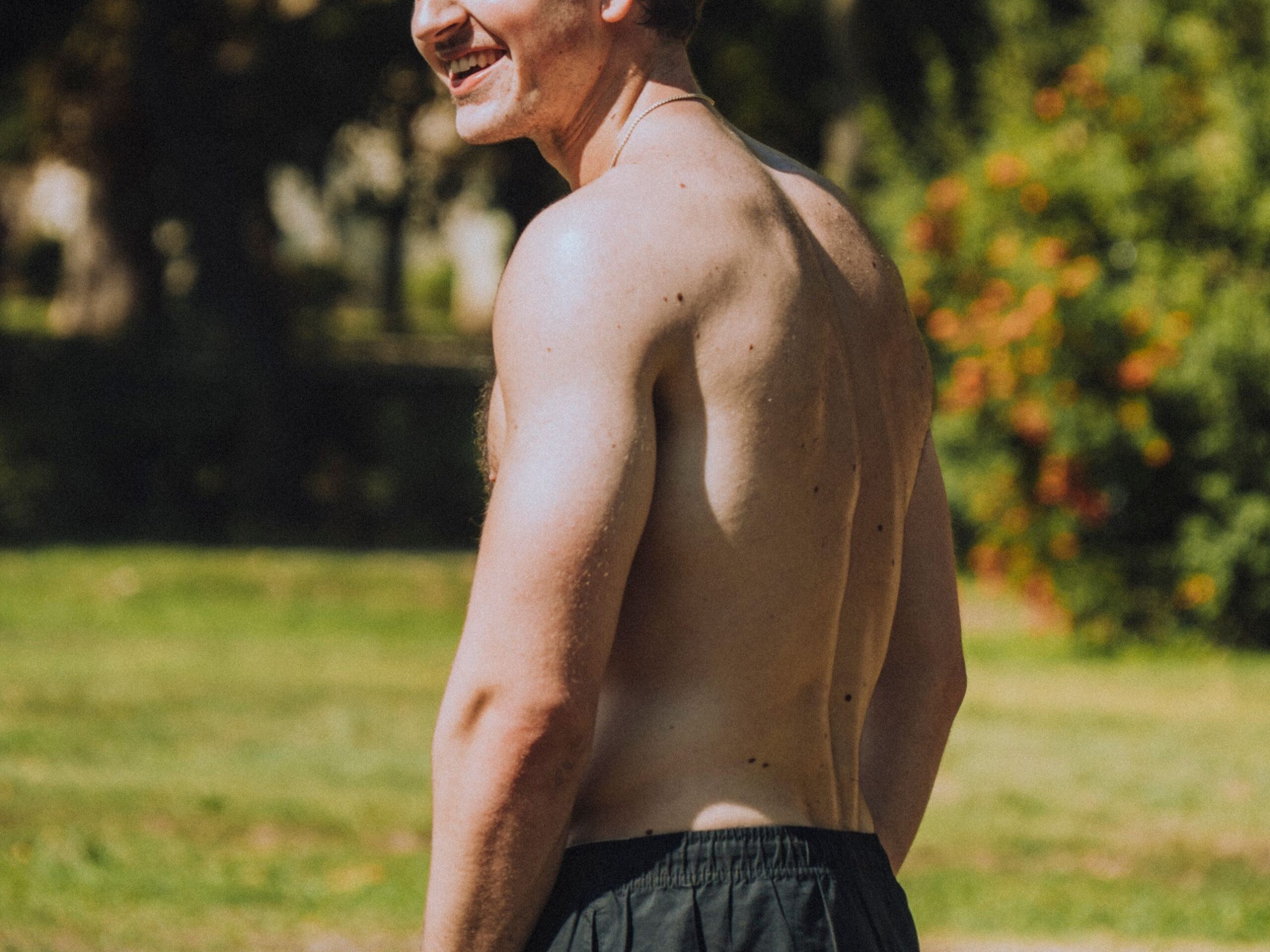 gay shirtless male bloke gay cruising in Hamstead Heath in the UK London looking for gay park hookups